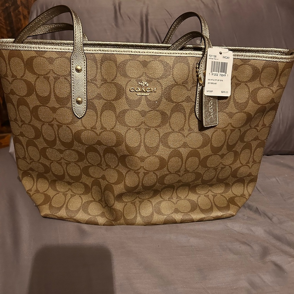 Brand new. Coach Signature Metallic City Zip Tote